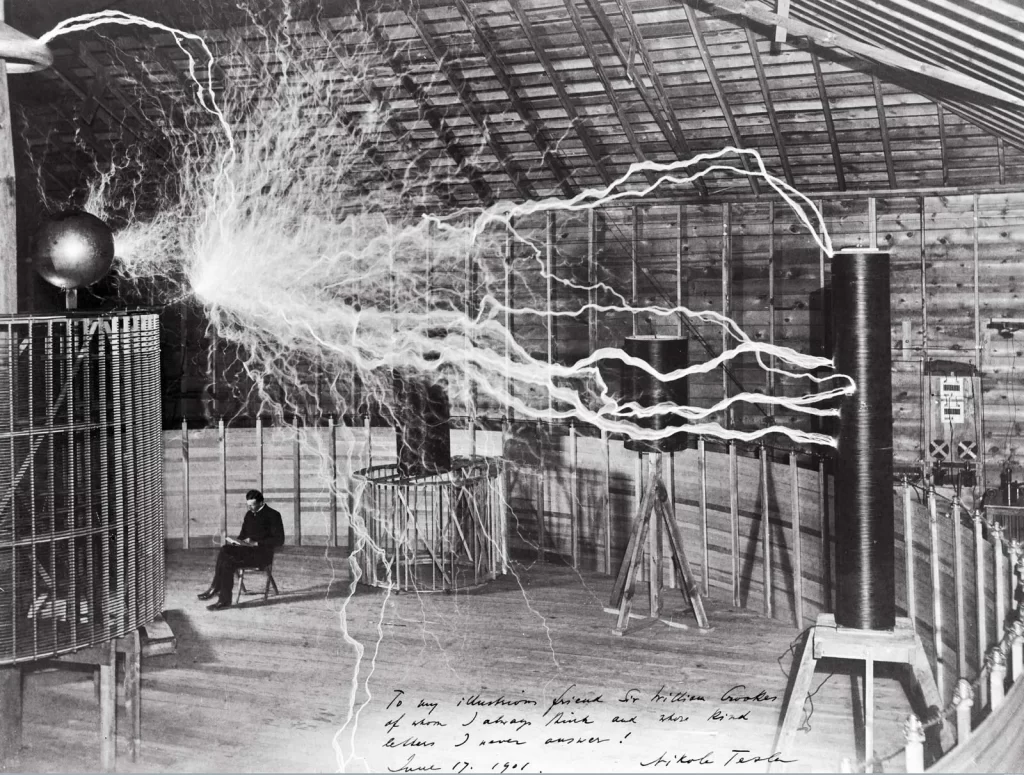 Nikola Tesla(নিকোলা টেসলা) in his lab. 